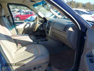 2005 Mercury Mountaineer Convenience z VIN 4M2ZU86W15UJ16890, wystawiony jako IAAI lot #41352732 z przebiegiem 199 675 mil mil oraz . Historia ofert i sprzedaży dostępna na DreamBid. Obrazek 5.