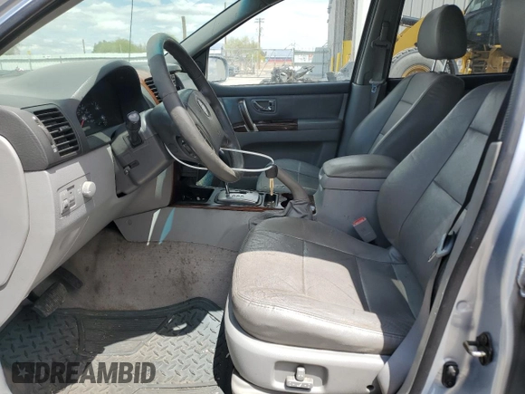 2006 Kia Sorento LX z VIN KNDJD733265572903, wystawiony jako Copart lot #56123945 z przebiegiem 185 664 mil mil oraz Szkoda całkowita • Salvage title. Historia ofert i sprzedaży dostępna na DreamBid. Obrazek 7.