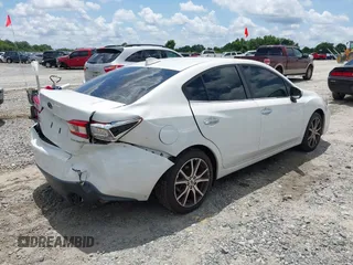 2019 Subaru Impreza Limited z VIN 4S3GKAU63K3606908, wystawiony jako IAAI lot #42442893 z przebiegiem 79 591 mil mil oraz . Historia ofert i sprzedaży dostępna na DreamBid. Obrazek 4.