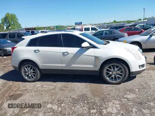 2013 Cadillac SRX Premium Collection with VIN 3GYFNEE33DS554556, listed as a IAAI auction lot 42152972 with 144,668 mi miles and . Bid and sale history available at DreamBid. Image 13.