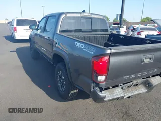 2019 Toyota Tacoma SR with VIN 3TMCZ5AN7KM251625, listed as a IAAI auction lot 42527478 with 45,689 mi miles and . Bid and sale history available at DreamBid. Image 3.