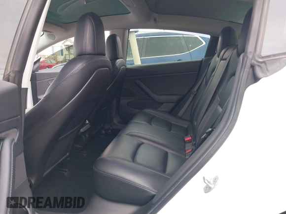2019 Tesla Model 3 Mid Range with VIN 5YJ3E1EA5KF397098, listed as a IAAI auction lot 41943570 with 72,046 mi miles and . Bid and sale history available at DreamBid. Image 8.