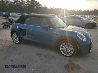 2022 MINI Convertible Cooper S z VIN WMW43DL00N3P16346, wystawiony jako Copart lot #48542555 z przebiegiem 19 138 mil mil oraz Tytuł czysty. Historia ofert i sprzedaży dostępna na DreamBid. Obrazek 4.