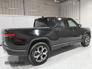 2022 Rivian R1T Adventure z VIN 7FCTGAAA5NN007486, wystawiony jako Copart lot #52649075 z przebiegiem 23 292 mil mil oraz Czysty tytuł • Clean title. Historia ofert i sprzedaży dostępna na DreamBid. Obrazek 3.