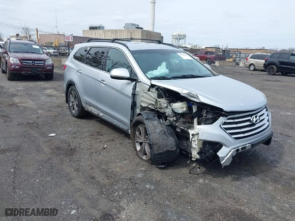 2014 Hyundai Santa Fe Limited with VIN KM8SNDHF4EU063737, listed as a IAAI auction lot 41941187 with 127,559 mi miles. Bid and sale history available at carsss.com. Image 1.