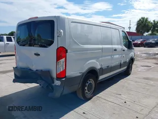 2015 Ford Transit Cargo with VIN 1FTNE1ZM2FKA78621, listed as a IAAI auction lot 41654632 with 234,709 mi miles and . Bid and sale history available at carsss.com. Image 4.