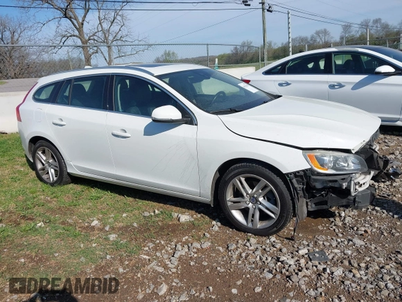 2015 Volvo V60 T5 Drive-E Premier z VIN YV140MEK2F1267396, wystawiony jako IAAI lot #41921329 z przebiegiem 93 937 mil mil oraz . Historia ofert i sprzedaży dostępna na DreamBid. Obrazek 14.