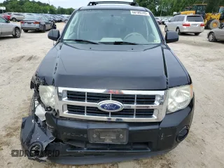 2012 Ford Escape XLS with VIN 1FMCU9C71CKA30319, listed as a Copart auction lot 60189745 with 214,736 mi miles and Salvage title. Bid and sale history available at DreamBid. Image 5.