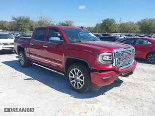 2018 GMC Sierra 1500 Denali with VIN 3GTU2PEJ9JG172983, listed as a IAAI auction lot 41784319 with 74,025 mi miles. Bid and sale history available at carsss.com. Image 1.
