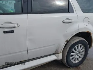 2009 Mercury Mariner Premier with VIN 4M2CU97G19KJ01231, listed as a IAAI auction lot 41674517 with Not Provided miles and . Bid and sale history available at DreamBid. Image 12.