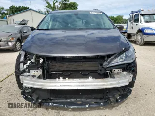 2017 Chrysler Pacifica Touring L with VIN 2C4RC1BG7HR569315, listed as a Copart auction lot 47018605 with 131,519 mi miles and Salvage Title. Bid and sale history available at DreamBid. Image 5.