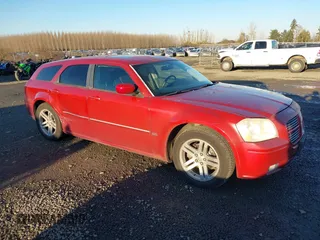 2005 Dodge Magnum SE with VIN 2D4FV48V55H648314, listed as a IAAI auction lot 41393142 with 166,197 mi miles. Bid and sale history available at carsss.com. Image 1.