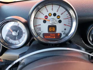 2011 MINI Convertible S z VIN WMWZP3C59BTX83202, wystawiony jako Copart lot #47138535 z przebiegiem 162 809 mil mil oraz Szkoda całkowita • Salvage title. Historia ofert i sprzedaży dostępna na DreamBid. Obrazek 9.