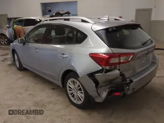 2017 Subaru Impreza Premium z VIN 4S3GTAB63H3705818, wystawiony jako IAAI lot #41568064 z przebiegiem 132 046 mil mil oraz . Historia ofert i sprzedaży dostępna na DreamBid. Obrazek 3.