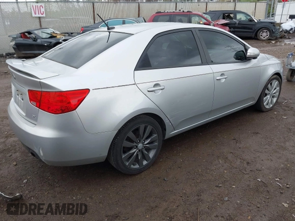 2010 Kia Forte SX with VIN KNAFW4A39A5230517, listed as a IAAI auction lot 41953297 with 154,711 mi miles. Bid and sale history available at carsss.com. Image 4.