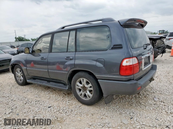 2003 Lexus LX 470 z VIN JTJHT00W033530306, wystawiony jako Copart lot #57162675 z przebiegiem 185 458 mil mil oraz Szkoda całkowita • Salvage title. Historia ofert i sprzedaży dostępna na DreamBid. Obrazek 2.