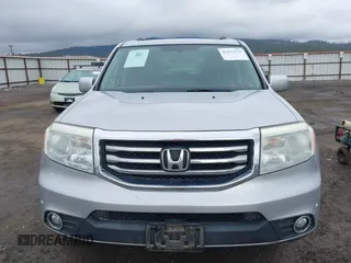 2015 Honda Pilot Touring with VIN 5FNYF4H94FB018152, listed as a IAAI auction lot 41812170 with 130,661 mi miles. Bid and sale history available at carsss.com. Image 12.