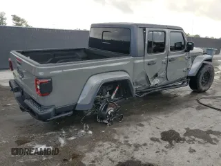 2021 Jeep Gladiator Sport S с VIN 1C6JJTAG1ML562354, выставлен на аукционе Copart как лот 54850185 с пробегом 67 473 миль миль и На запчасти • Non repairable. История ставок и продаж доступна на DreamBid. Изображение 3.