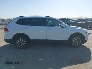 2021 Volkswagen Tiguan SE with VIN 3VV3B7AX9MM051920, listed as a IAAI auction lot 41826721 with 127,699 mi miles and . Bid and sale history available at DreamBid. Image 13.