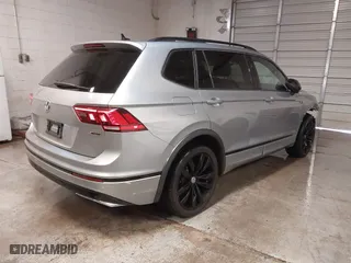 2021 Volkswagen Tiguan SE with VIN 3VV2B7AX1MM013884, listed as a IAAI auction lot 41313293 with 40,489 mi miles. Bid and sale history available at carsss.com. Image 4.