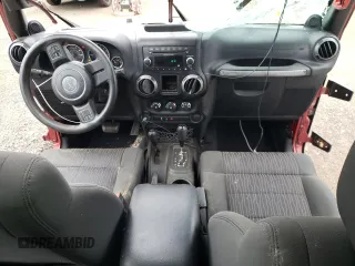 2012 Jeep Wrangler Unlimited Sport with VIN 1C4BJWDG6CL234419, listed as a Copart auction lot 62284825 with 66,649 mi miles and Salvage title. Bid and sale history available at DreamBid. Image 8.