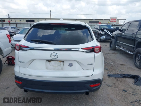 2016 Mazda CX-9 Sport z VIN JM3TCABY1G0111316, wystawiony jako IAAI lot #42085945 z przebiegiem 98 691 mil mil oraz . Historia ofert i sprzedaży dostępna na DreamBid. Obrazek 17.