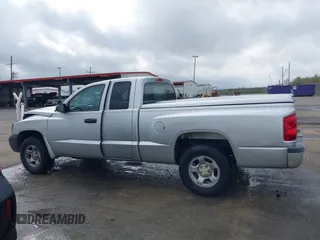 2005 Dodge Dakota ST with VIN 1D7HE22K25S119460, listed as a IAAI auction lot 41790592 with 104,995 mi miles and . Bid and sale history available at DreamBid. Image 14.