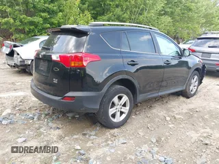 2013 Toyota RAV4 XLE with VIN 2T3RFREV9DW057202, listed as a IAAI auction lot 42485454 with 207,032 mi miles and . Bid and sale history available at DreamBid. Image 4.