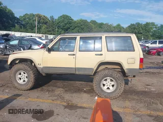 1995 Jeep Cherokee Sport with VIN 1J4FJ68S3SL555908, listed as a IAAI auction lot 42222016 with 283,444 mi miles and . Bid and sale history available at DreamBid. Image 14.