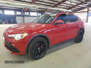 2018 Alfa Romeo Stelvio Sport z VIN ZASFAKPNXJ7B93360, wystawiony jako Copart lot #49785475 z przebiegiem 106 167 mil mil oraz Tytuł czysty. Historia ofert i sprzedaży dostępna na DreamBid. Obrazek 1.