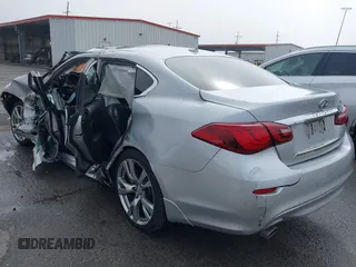 2018 Infiniti Q70 Luxe с VIN JN1BY1PPXJM330669, выставлен на аукционе IAAI как лот 41627984 с пробегом Не указан миль и . История ставок и продаж доступна на DreamBid. Изображение 3.