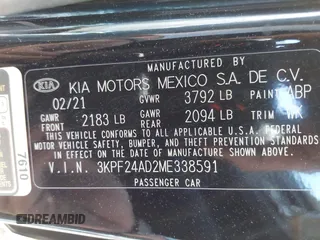 2021 Kia Forte LXS z VIN 3KPF24AD2ME338591, wystawiony jako IAAI lot #42231929 z przebiegiem 86 008 mil mil oraz . Historia ofert i sprzedaży dostępna na DreamBid. Obrazek 9.