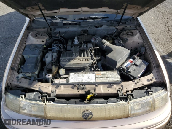 1993 Mercury Sable z VIN 1MELM5849PA655685, wystawiony jako Copart lot #85732984 z przebiegiem 98 081 mil mil oraz Tytuł czysty. Historia ofert i sprzedaży dostępna na DreamBid. Obrazek 11.
