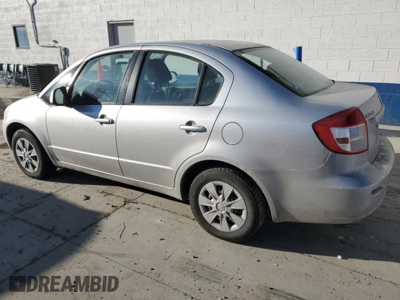 2010 Suzuki SX4 LE with VIN JS2YC5A27A6300498, listed as a Copart auction lot 43036655 with 237,647 mi miles and Salvage Title. Bid and sale history available at carsss.com. Image 2.