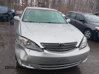 2004 Toyota Camry LE with VIN 4T1BF30K14U578385, listed as a IAAI auction lot 41547709 with 217,434 mi miles. Bid and sale history available at carsss.com. Image 12.
