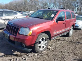 2008 Jeep Grand Cherokee Laredo with VIN 1J8GR48K28C164998, listed as a IAAI auction lot 41844702 with 999,999 mi miles. Bid and sale history available at carsss.com. Image 2.