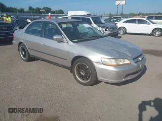 1998 Honda Accord LX with VIN 1HGCG5647WA267494, listed as a IAAI auction lot 42800612 with 217,236 mi miles and . Bid and sale history available at DreamBid. Image 1.