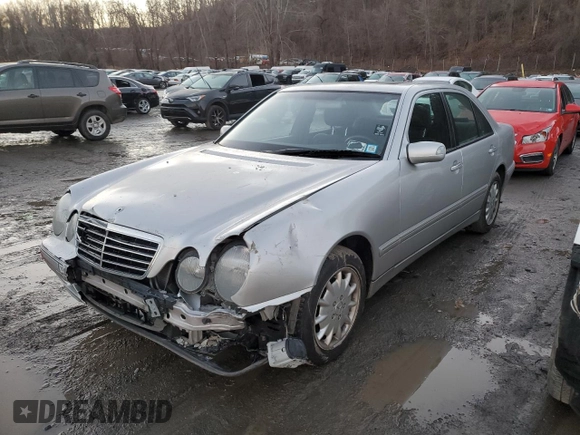 2002 Mercedes-Benz E-Class with VIN WDBJF82J32X066803, listed as a Copart auction lot 85474614 with 77,358 mi miles and Salvage Title. Bid and sale history available at carsss.com. Image 1.