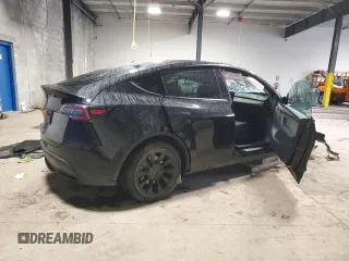 2024 Tesla Model Y с VIN 7SAYGDED0RF084081, выставлен на аукционе Copart как лот 55992195 с пробегом 43 871 миль миль и Списание • Salvage title. История ставок и продаж доступна на DreamBid. Изображение 3.