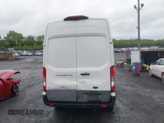 2021 Ford Transit Cargo with VIN 1FTBW1X84MKA98047, listed as a IAAI auction lot 42313747 with 65,600 mi miles and . Bid and sale history available at DreamBid. Image 16.