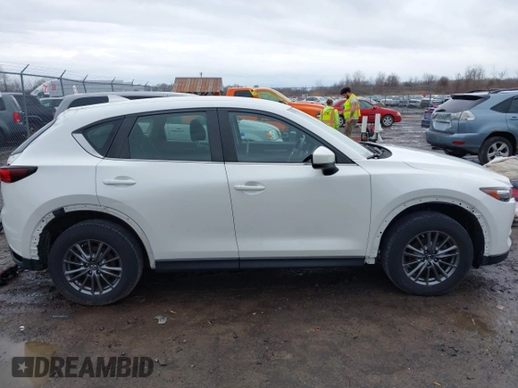 2019 Mazda CX-5 Sport with VIN JM3KFBBM2K0629966, listed as a IAAI auction lot 41953702 with 48,496 mi miles and . Bid and sale history available at DreamBid. Image 14.