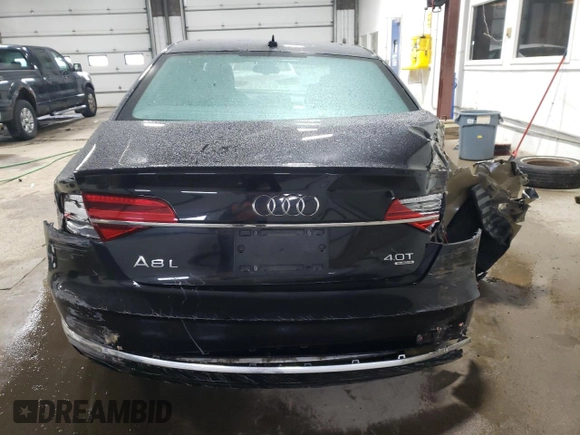 2015 Audi A8 4.0T z VIN WAU32AFD0FN017865, wystawiony jako Copart lot #37065594 z przebiegiem 55 632 mil mil oraz Szkoda całkowita • Salvage title. Historia ofert i sprzedaży dostępna na DreamBid. Obrazek 6.