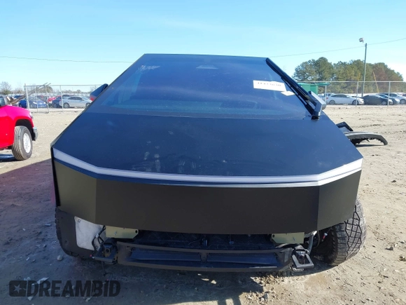 2024 Tesla Cybertruck z VIN 7G2CEHEDXRA022640, wystawiony jako IAAI lot #41423630 z przebiegiem 18 474 mil mil oraz . Historia ofert i sprzedaży dostępna na DreamBid. Obrazek 13.