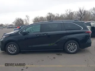 2022 Toyota Sienna LE z VIN 5TDKSKFC1NS042455, wystawiony jako IAAI lot #41921094 z przebiegiem 84 810 mil mil oraz . Historia ofert i sprzedaży dostępna na DreamBid. Obrazek 14.