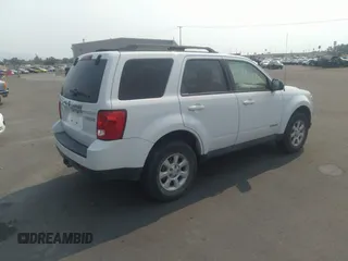 2008 Mazda Tribute Touring with VIN 4F2CZ96138KM32735, listed as a IAAI auction lot 31145122 with 206,608 mi miles and . Bid and sale history available at DreamBid. Image 4.