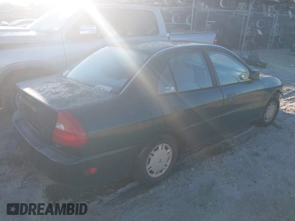 1999 Mitsubishi Mirage DE z VIN JA3AY26A0XU017889, wystawiony jako IAAI lot #40457172 z przebiegiem Nie podano mil oraz . Historia ofert i sprzedaży dostępna na DreamBid. Obrazek 4.