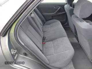 2001 Toyota Camry CE z VIN JT2BG22K410587070, wystawiony jako IAAI lot #42388043 z przebiegiem 119 183 mil mil oraz . Historia ofert i sprzedaży dostępna na DreamBid. Obrazek 8.