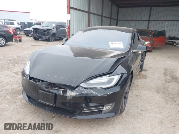 2018 Tesla Model S 75D with VIN 5YJSA1E22JF282828, listed as a IAAI auction lot 41595543 with 72,571 mi miles and . Bid and sale history available at DreamBid. Image 16.