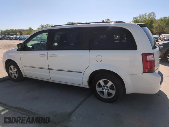 2010 Dodge Grand Caravan SXT with VIN 2D4RN5D16AR444938, listed as a Copart auction lot 56762695 with 251,437 mi miles and Clean Title. Bid and sale history available at DreamBid. Image 2.