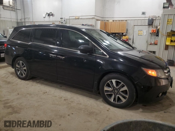 2014 Honda Odyssey Touring z VIN 5FNRL5H91EB128917, wystawiony jako Copart lot #49353085 z przebiegiem 208 871 mil mil oraz Czysty tytuł • Clean title. Historia ofert i sprzedaży dostępna na DreamBid. Obrazek 4.